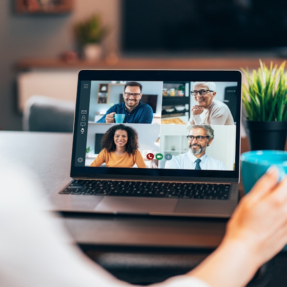 team in virtual meeting on laptop